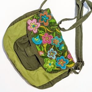 Lightweight green Accessorize bag with embroidered flowers